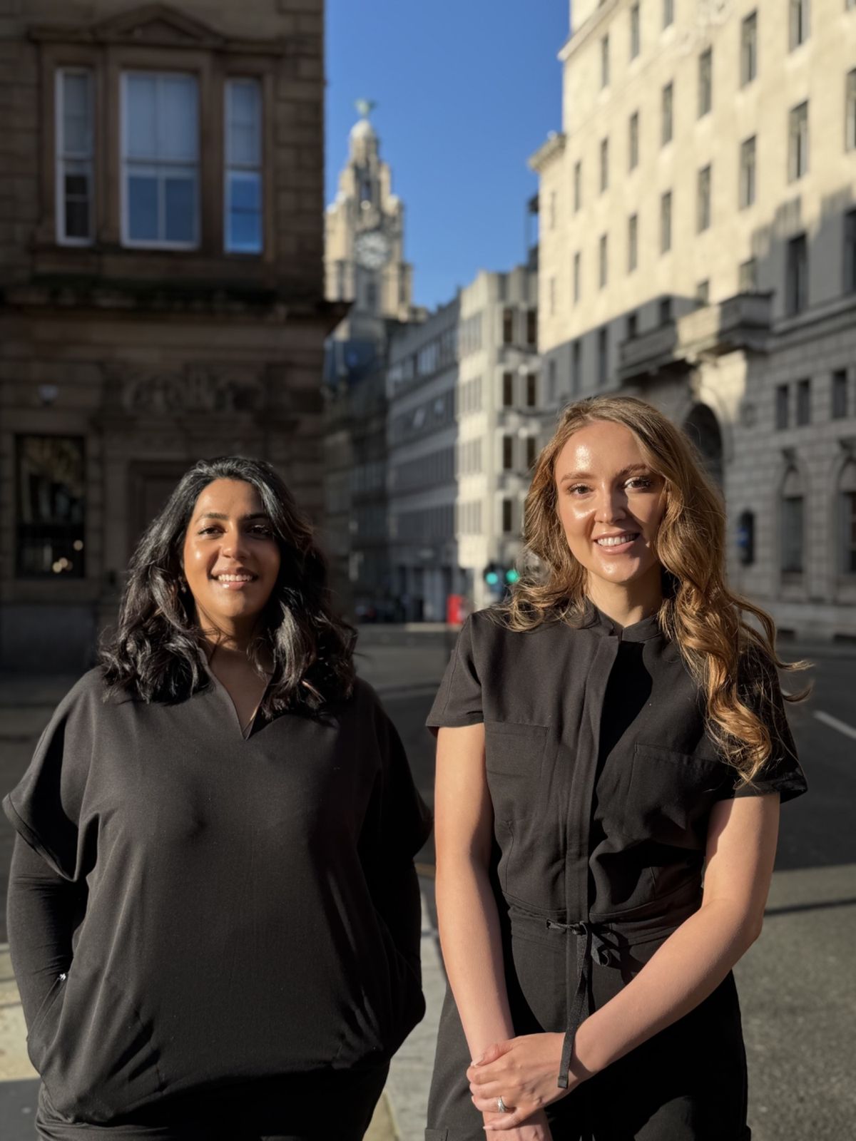Dr Misha and Dr Amy outside Revitalise Aesthetics on Castle Street Liverpool